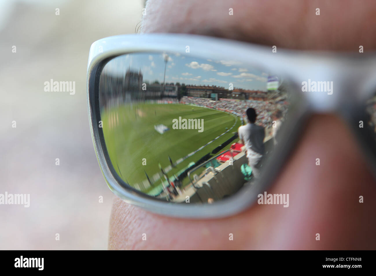 Spectator watching Test match cricket at The Oval, London, England, UK. Match was England v South Africa, Second Test. 2012. Stock Photo