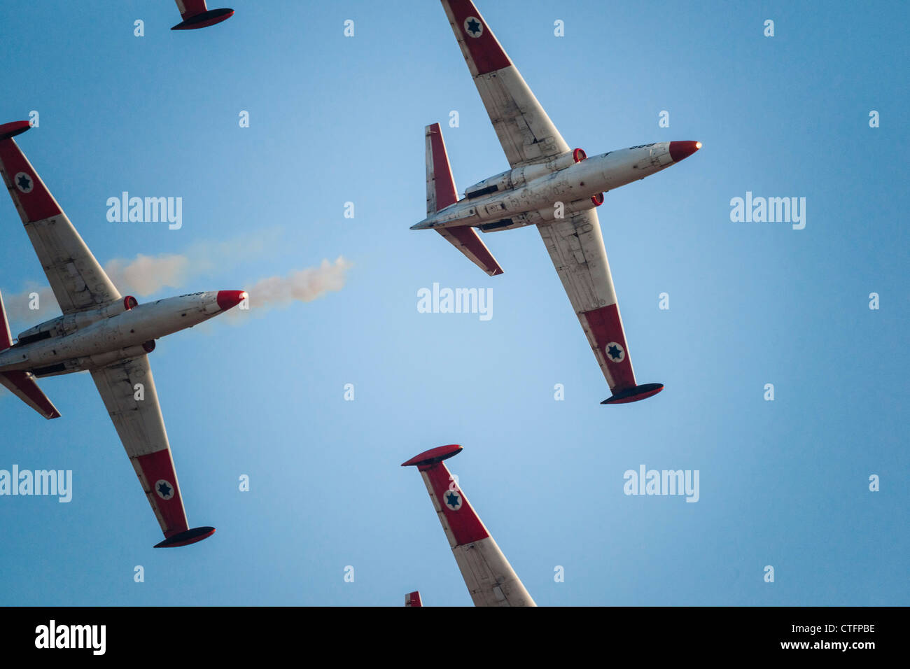 Israeli Air Force aerobatic team planes fly in a close formation During an Airshow, 2010 Stock Photo