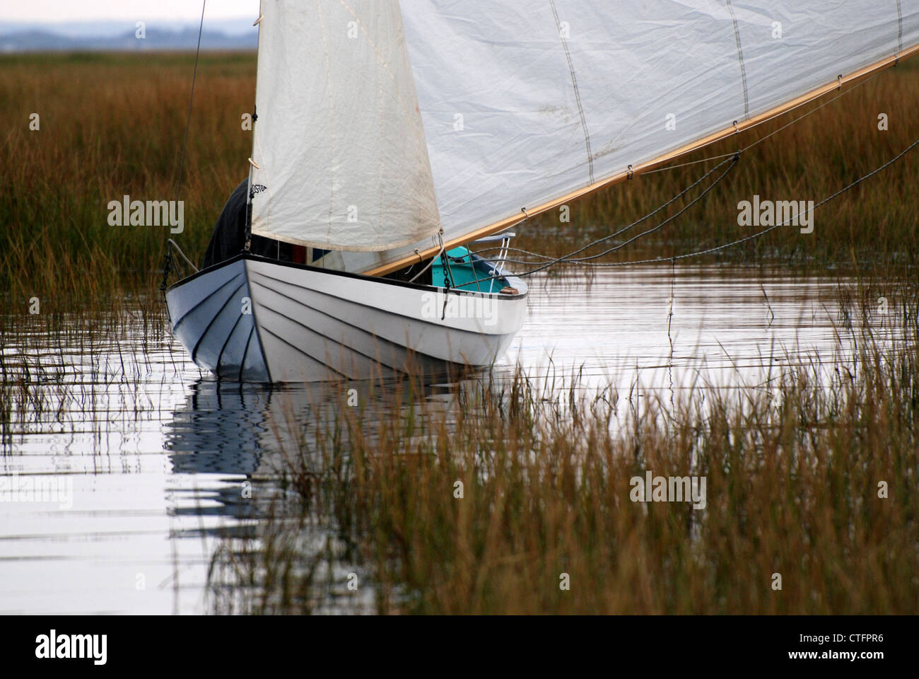 Beachcomber-Alpha Dory ghosting in a creek. This 100 year ...