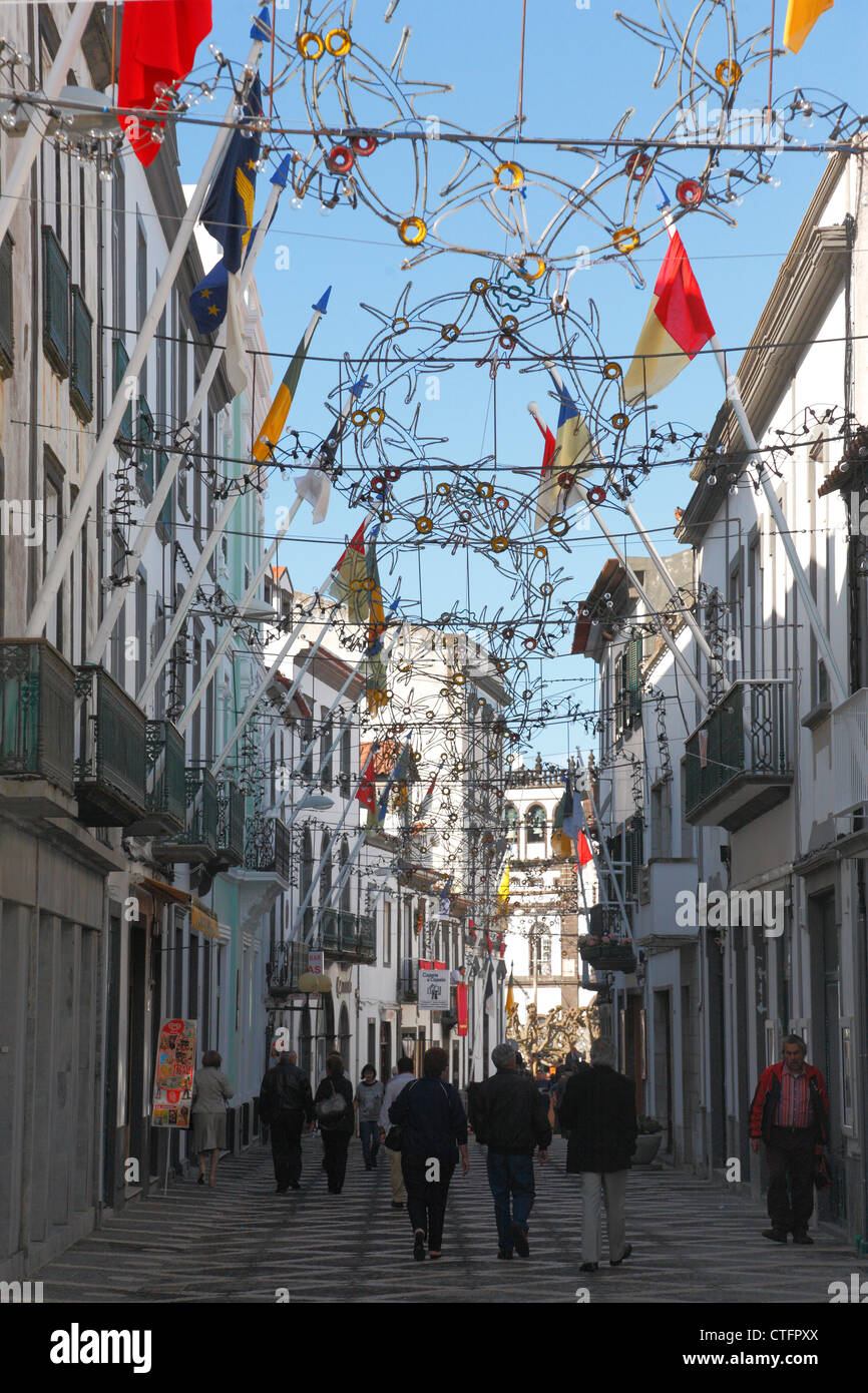 Decorated street during festival in the city of Ponta Delgada. Sao Miguel island, Azores, Portugal. Stock Photo