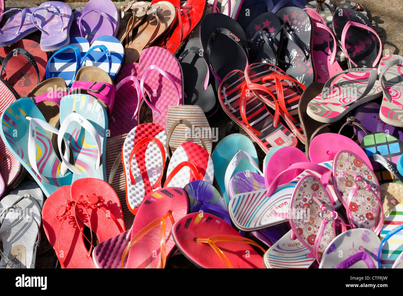 Girls' shoes removed outside Buddhist temple, Sri Lanka Stock Photo - Alamy