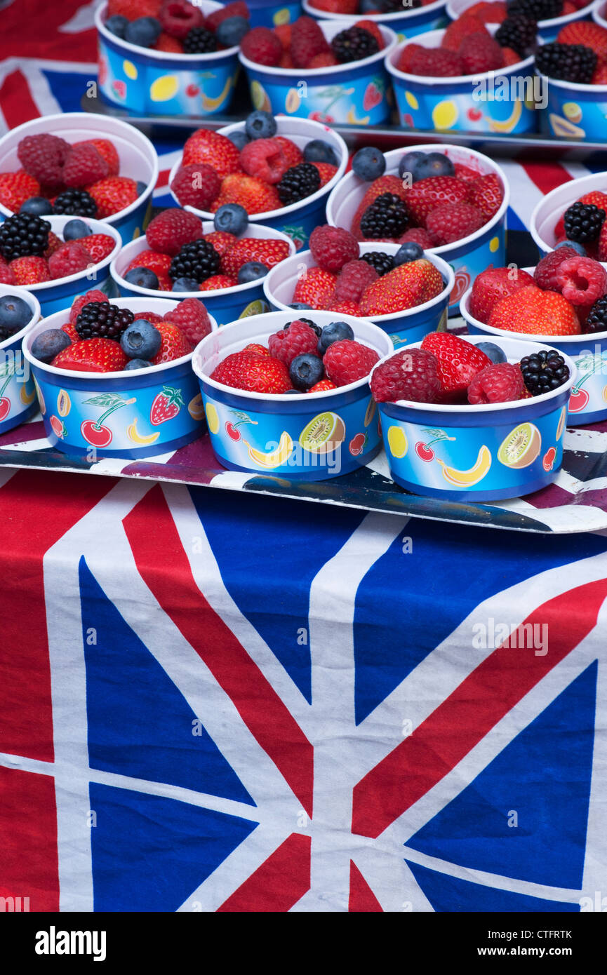 Fruit bowls on a market stall covered in a union jack flag. Portobello