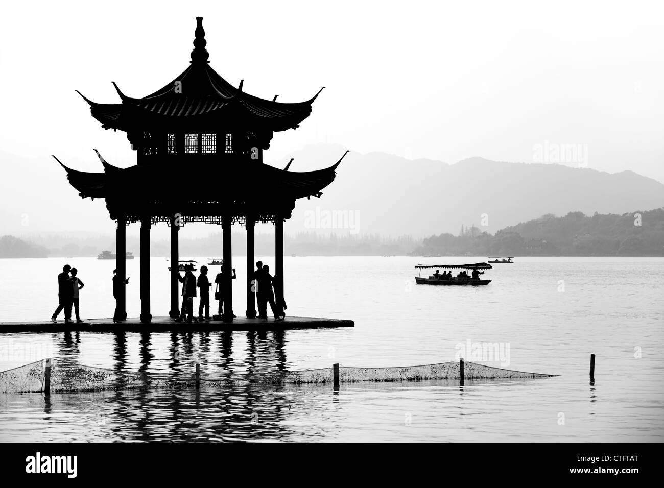 Chinese pavilion in silhouette, Hangzhou,China. Stock Photo