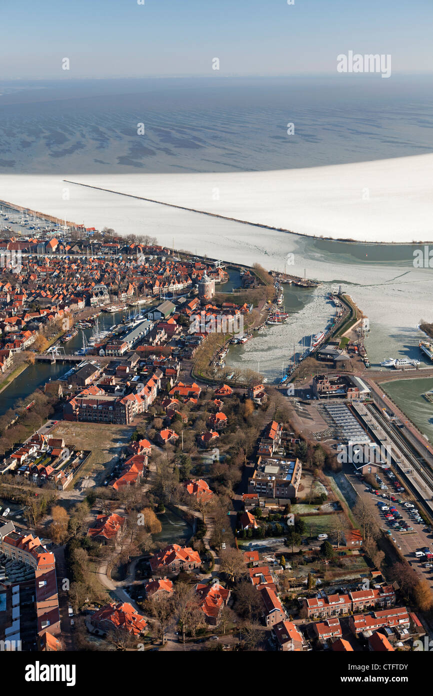 The Netherlands, Enkhuizen, Floating ice in lake called Ijsselmeer. Aerial. Stock Photo
