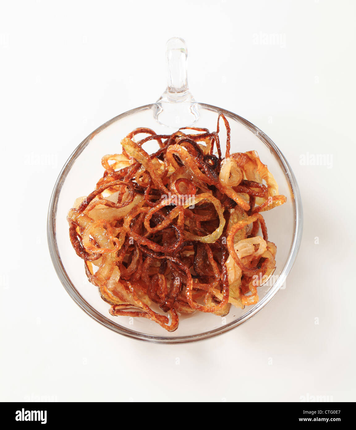 Dish of browned onion - studio shot Stock Photo