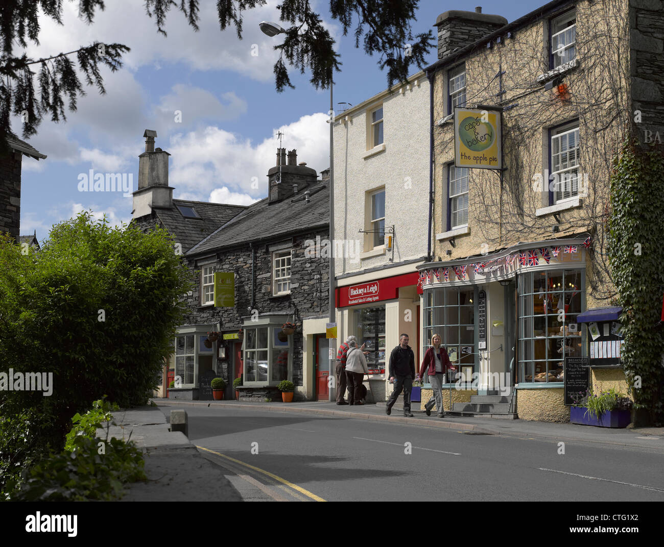 Bakery and shops stores in the town centre in summer Rydal Road Ambleside Cumbria England UK United Kingdom GB Great Britain Stock Photo