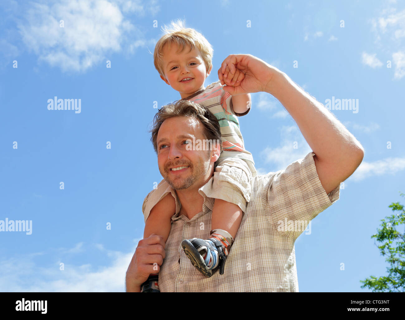 Father and baby son piggyback Stock Photo
