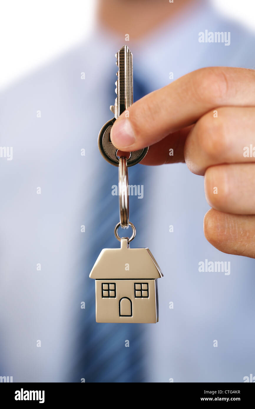 Real estate agent giving house keys Stock Photo Alamy
