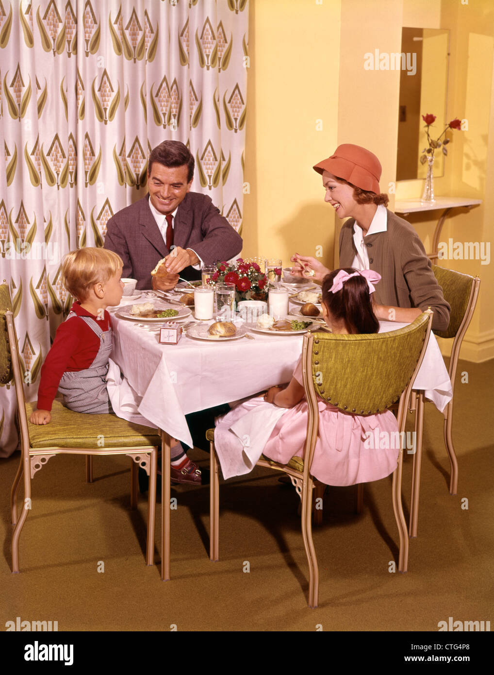 1950s1960s FAMILY DINING IN RESTAURANT Stock Photo