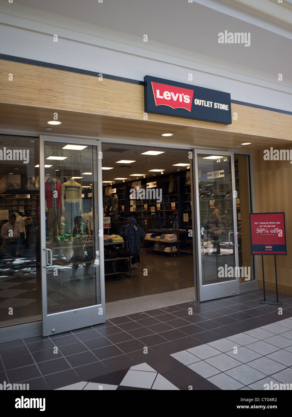 family Critically pair Levi's store interior hi-res stock photography and images - Alamy
