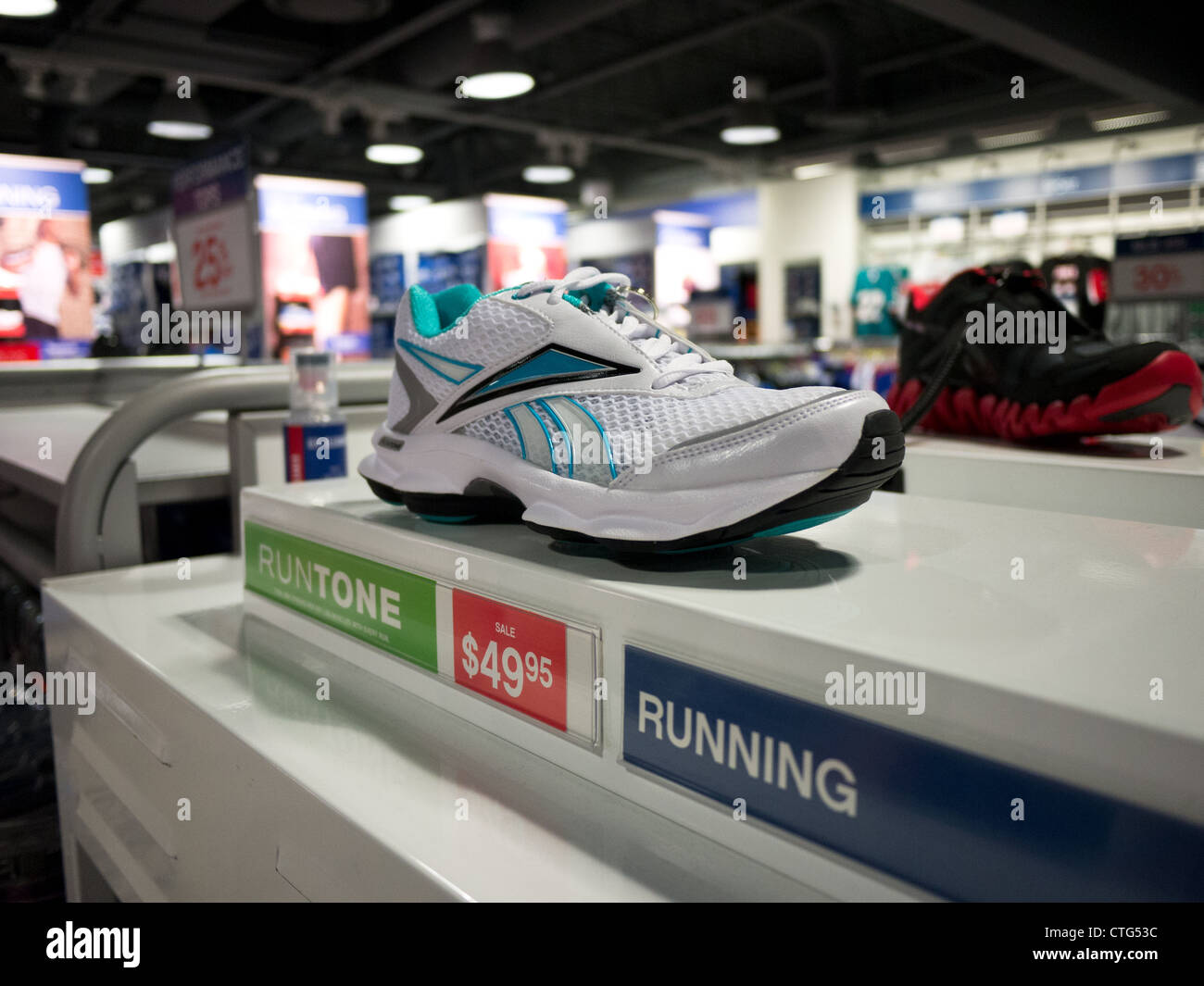running shoe display sale retail store Stock Photo