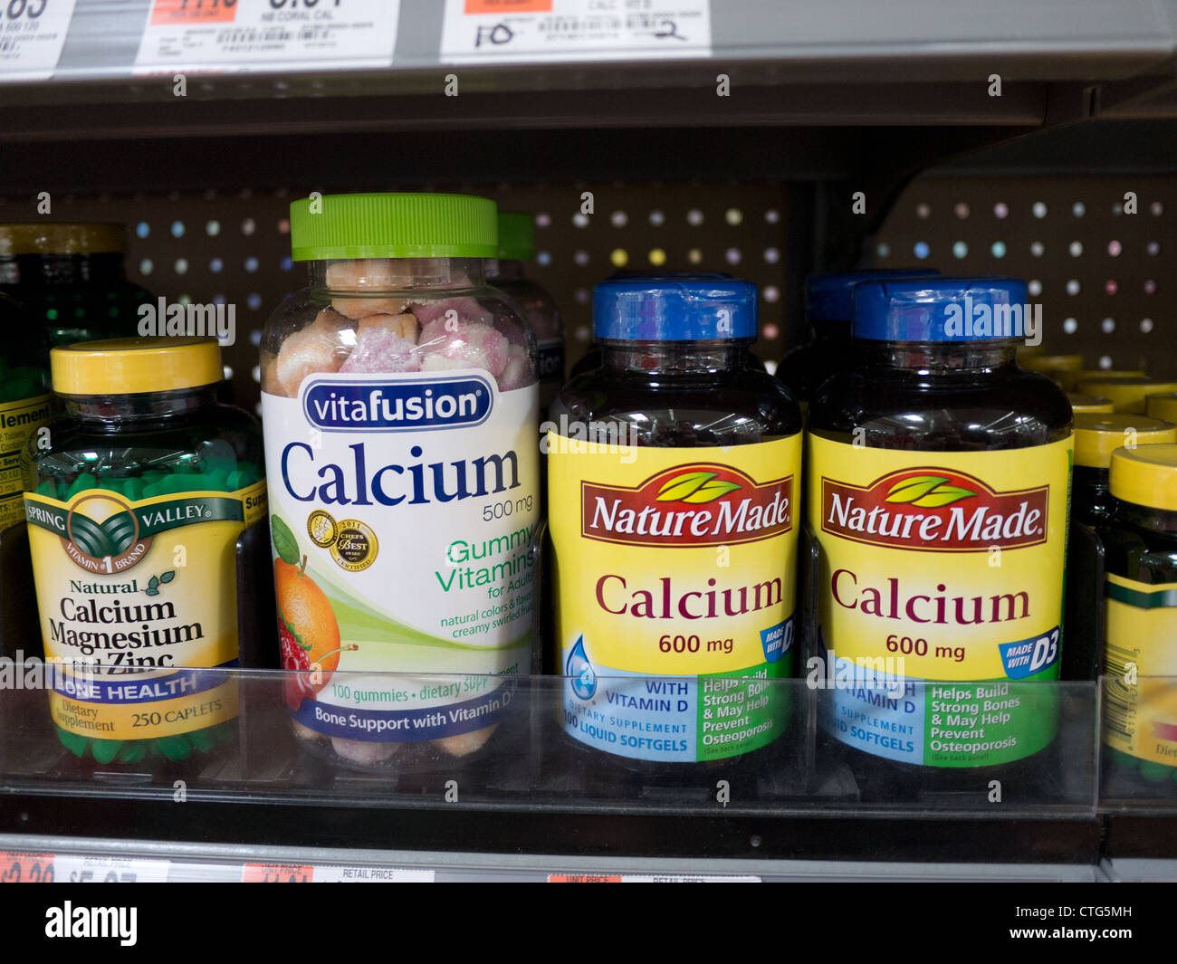 pharmacy shelves calcium pills products Stock Photo