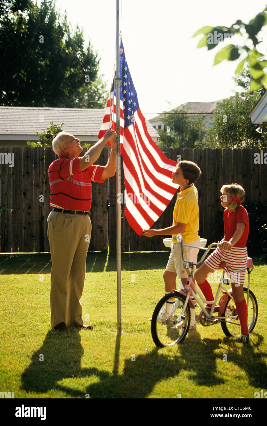 Child raising flag pole hi-res stock photography and images - Alamy