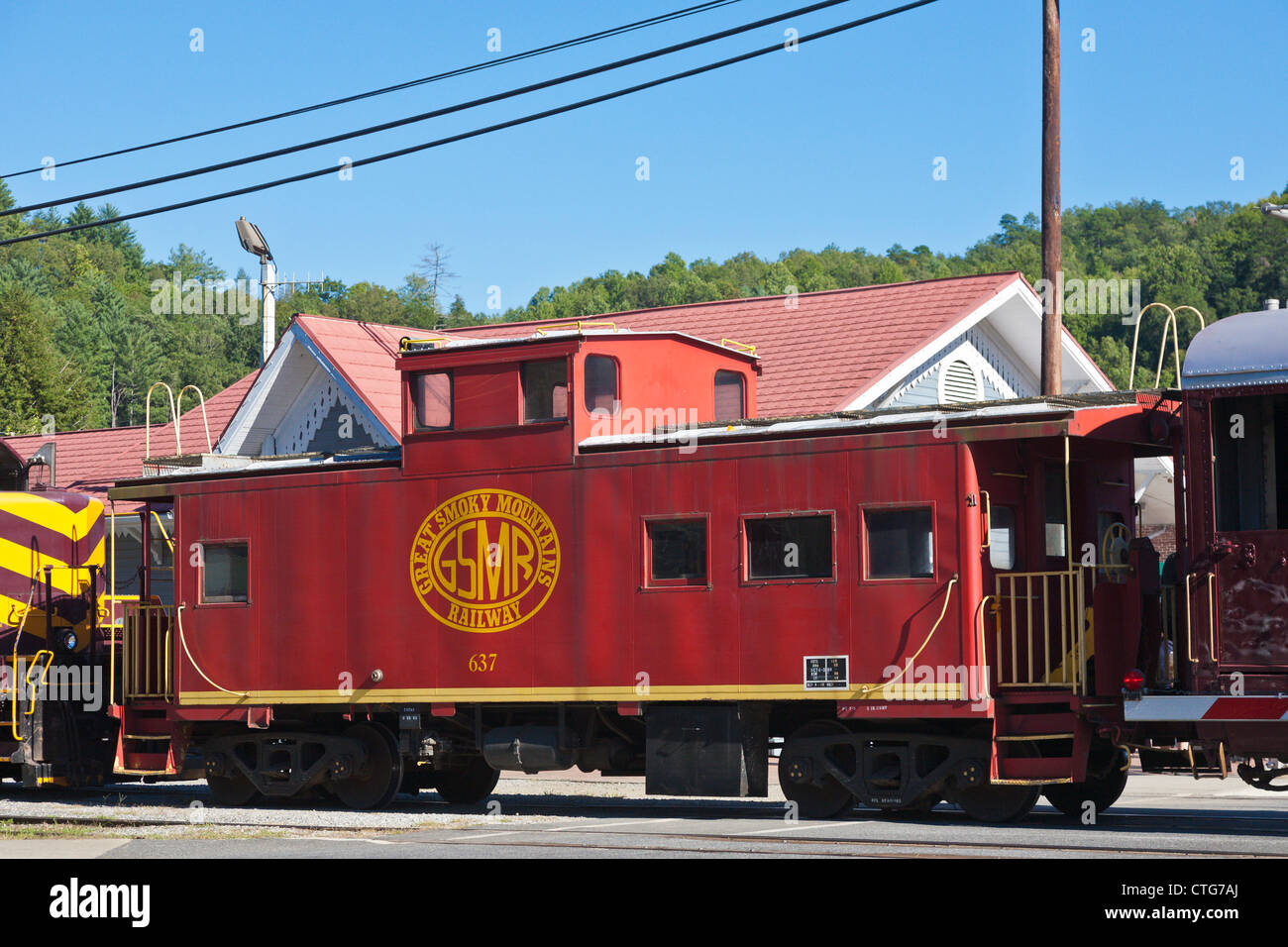 Red Great Smoky Mountain Railway caboose at the station in Bryson City, North Carolina Stock Photo