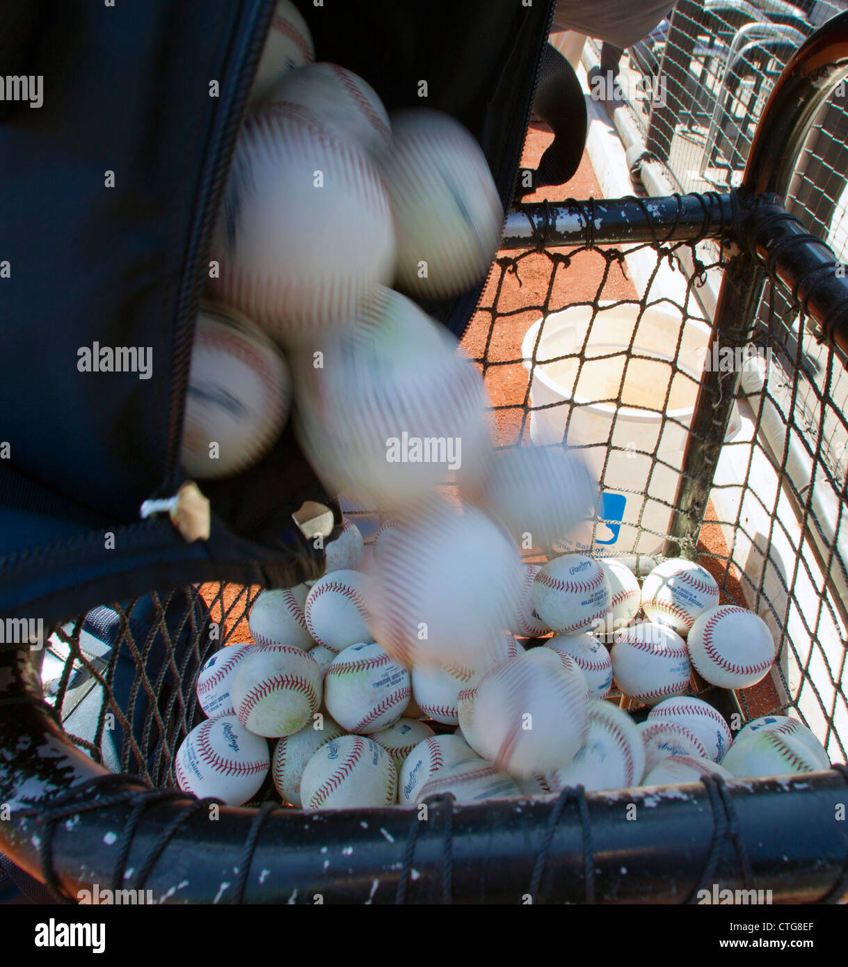 Baseballs ready for batting practice Stock Photo Alamy
