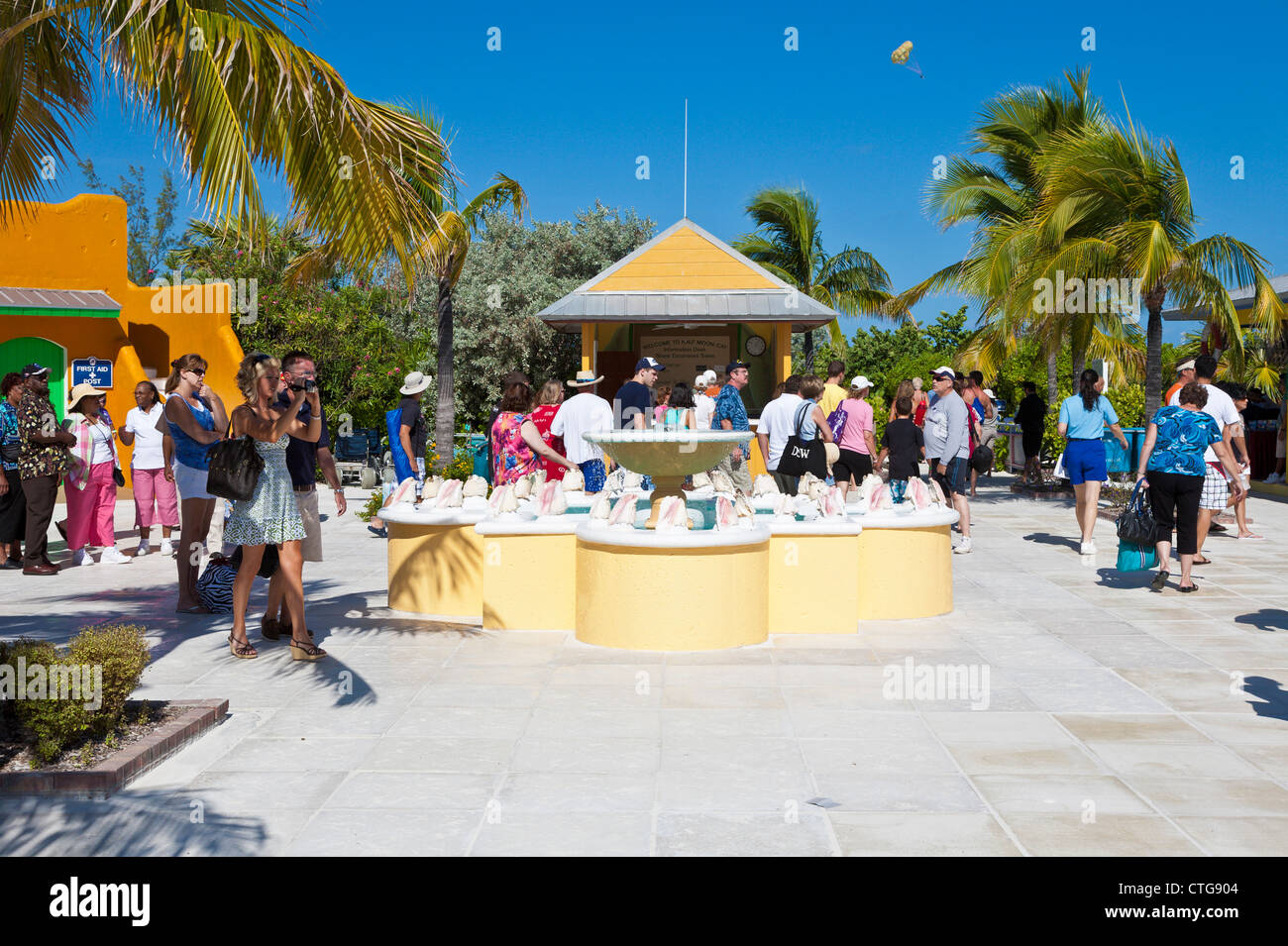 Cruise ship passengers entering shopping plaza at Half Moon Cay