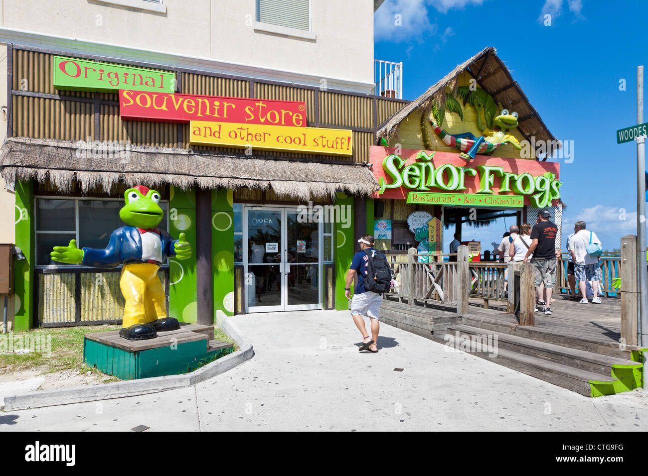 Tourists going to Senor Frog's souvenir shop in Nassau, Bahamas Stock Photo