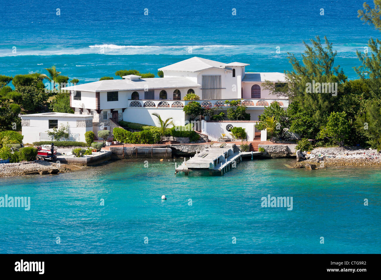 Private resort home with private dock and boat ramp on Paradise Island in Nassau, Bahamas Stock Photo