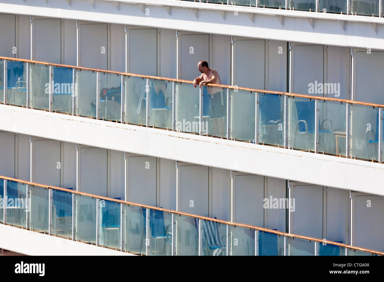 Man overlooks balcony on old cruise ship in Nassau, Bahamas Stock Photo -  Alamy