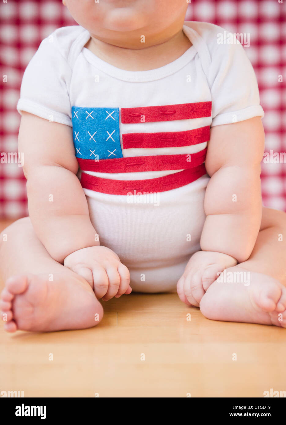 Caucasian baby boy in onesie with American flag on it Stock Photo