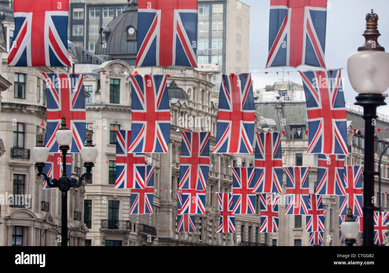 Rows of Union Jacks hanging on Regent Street to celebrate Queen Elizabeth II's Diamond Jubilee June 2012 London England UK Stock Photo