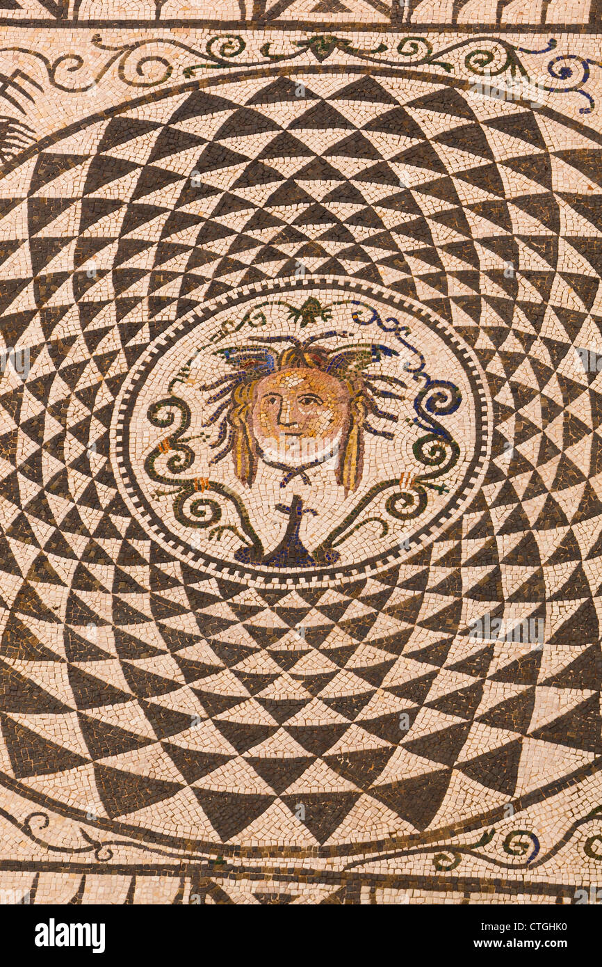 Carmona, Seville Province, Spain. Roman mosaic of Medusa in Town Hall. Stock Photo