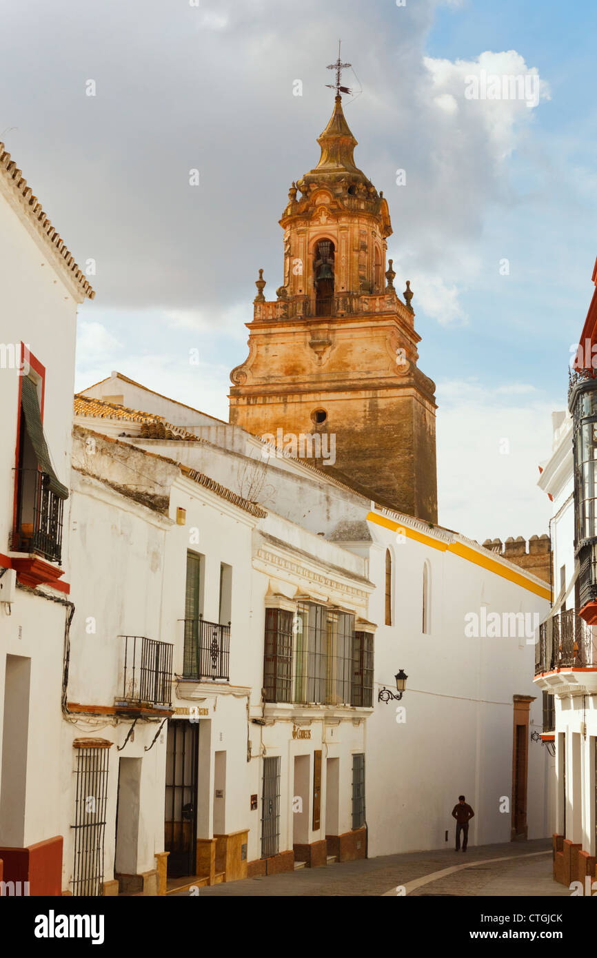 Carmona, Seville Province, Spain. Street scene with Church of San Bartolome. Stock Photo