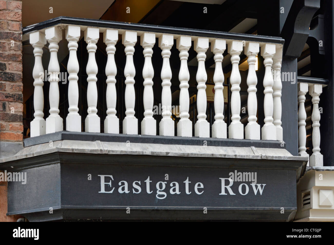 Black and white balcony balustrade spindles on Chester Eastgate Row covered shopping walkway at 1st floor level City of Chester Cheshire England UK Stock Photo