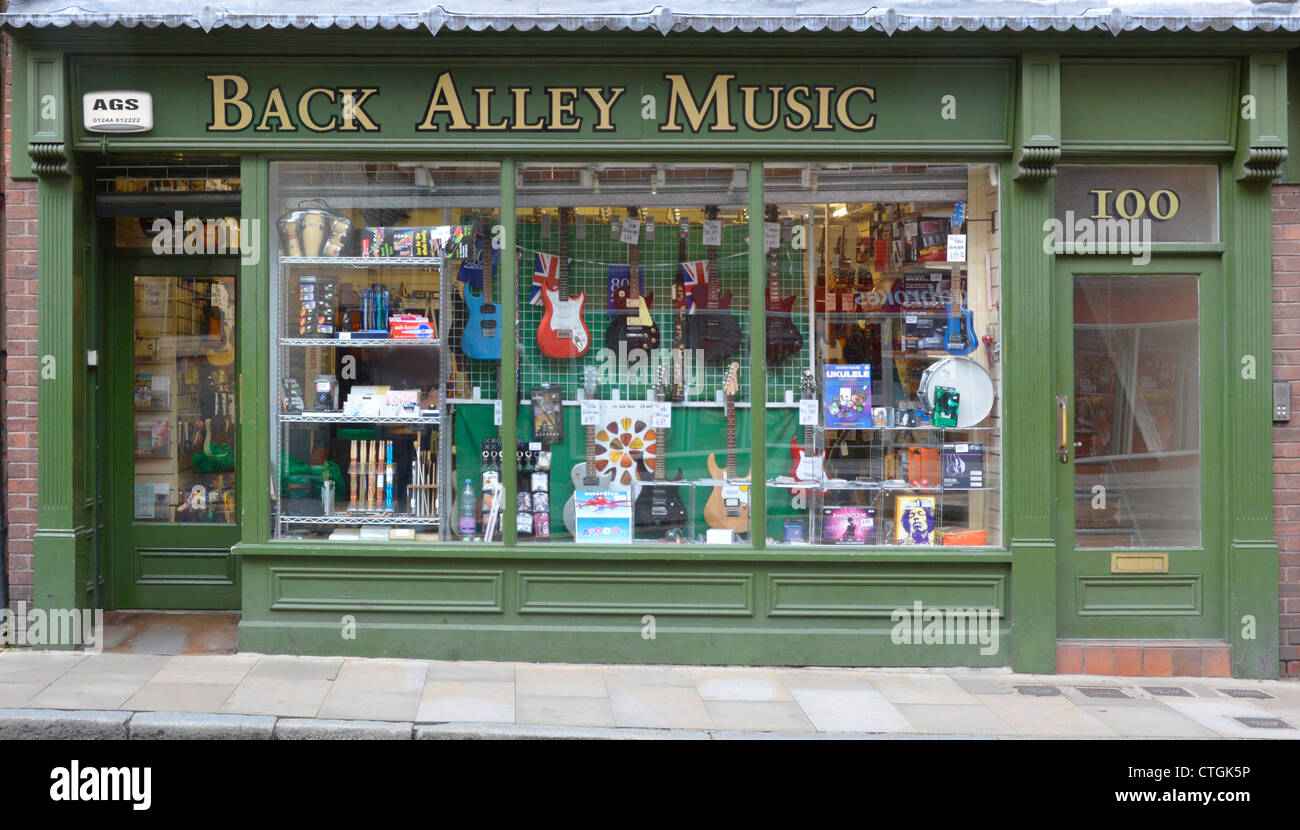 'Back Alley Music' shop front window display stockists of musical equipment in Northgate Street City of Chester Cheshire England UK Stock Photo