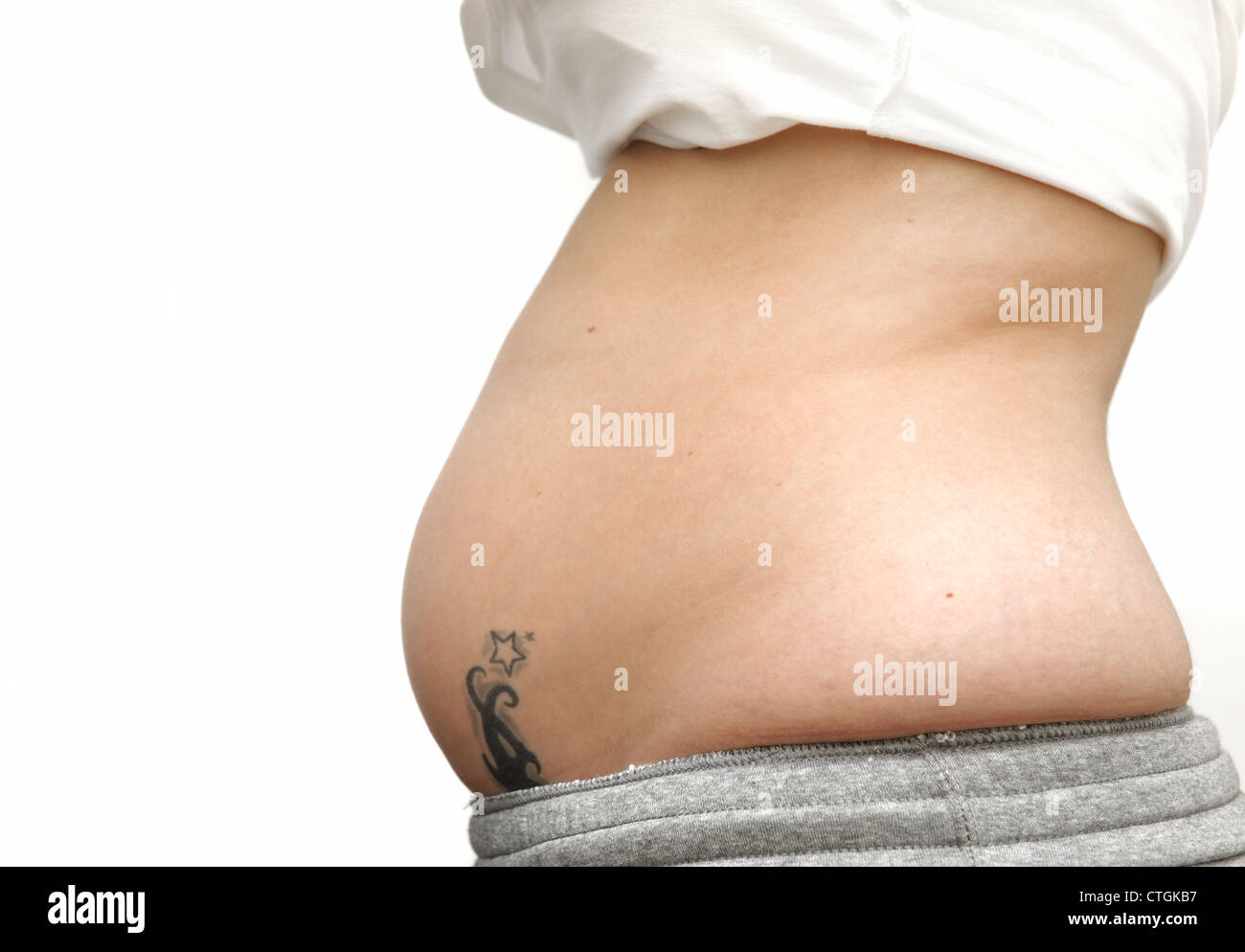 23 year old female 17 weeks pregnant Stock Photo