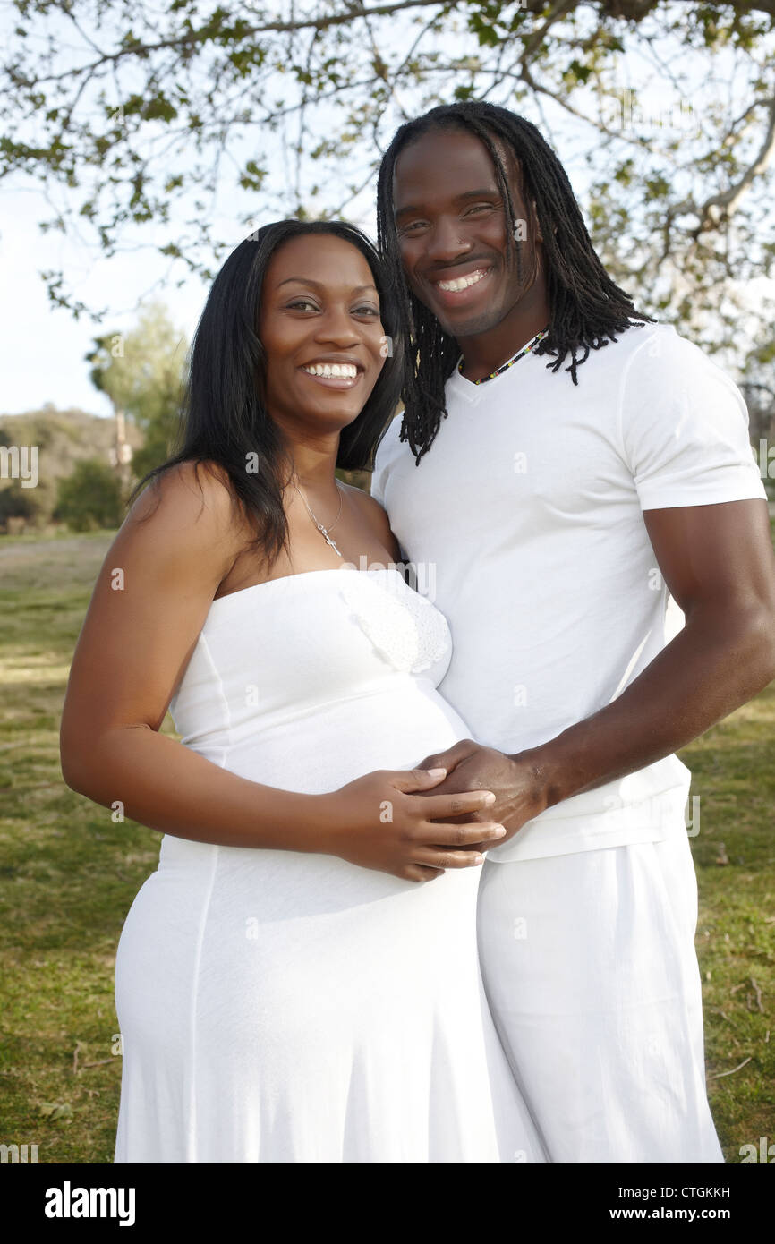 African American couple hugging in park Stock Photo - Alamy