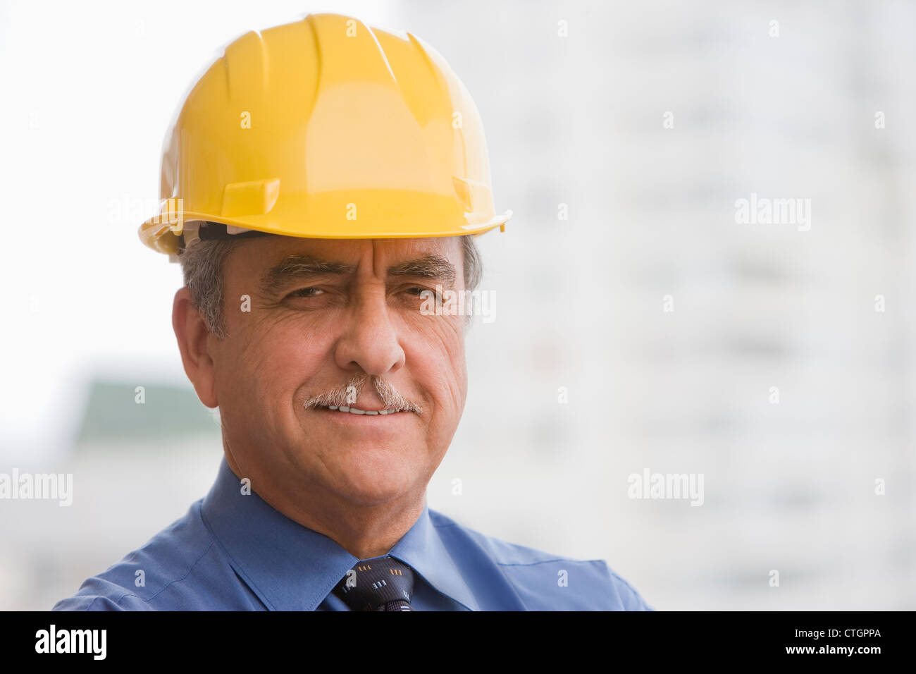 Senior man wearing hard hat hi-res stock photography and images - Alamy