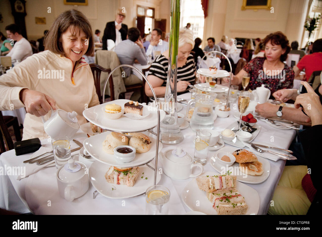 People enjoying afternoon tea in the Bath Pump Room Tea rooms