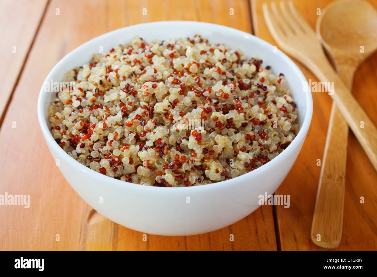 A bowl of cooked quinoa and amaranth. Contains red, white and black quinoa. Stock Photo