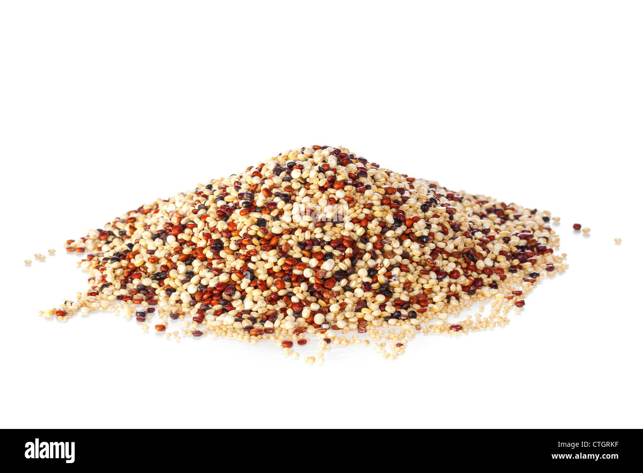 A heap of quinoa and amaranth isolated on white. Contains red, black and white quinoa. Stock Photo