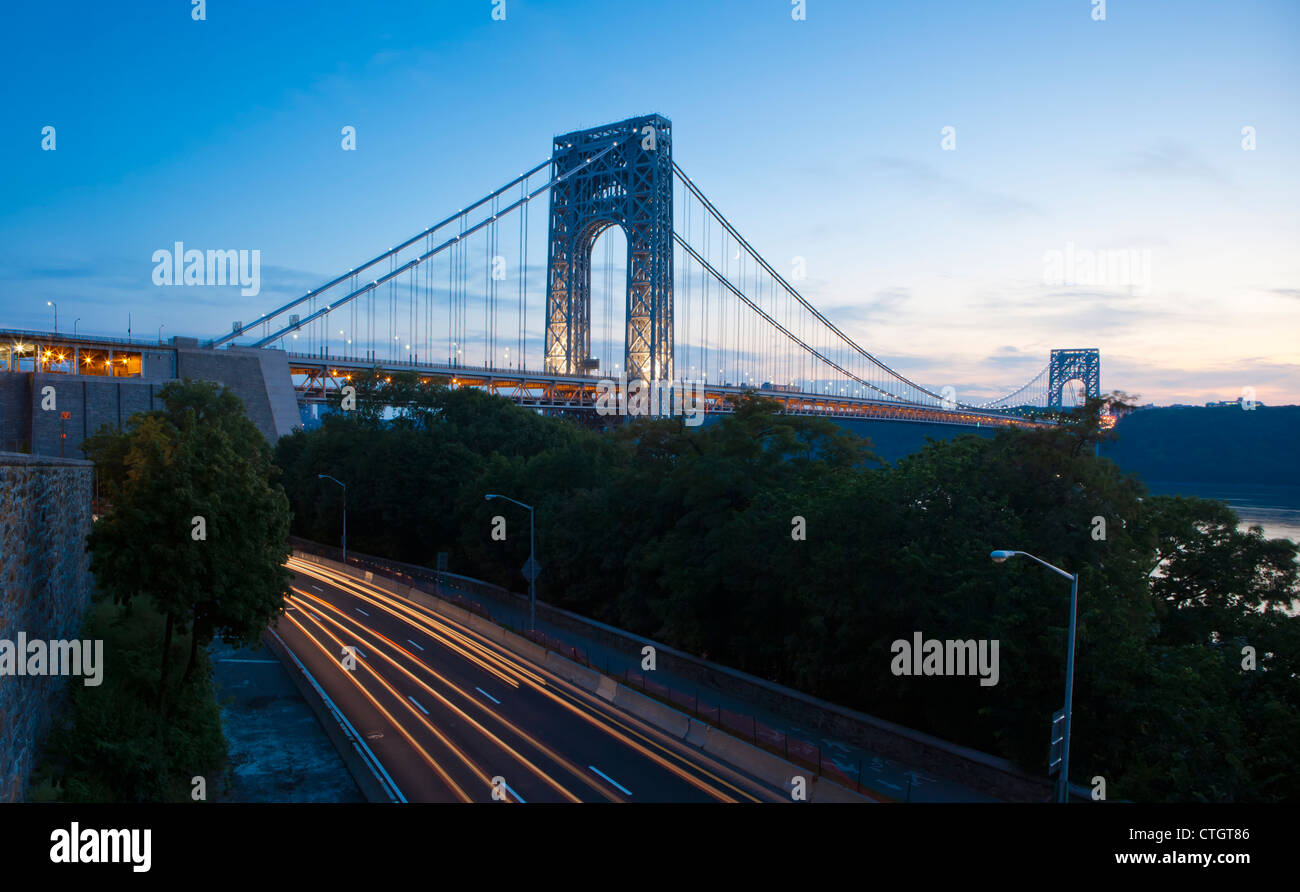 George Washington Bridge and streaming headlights Stock Photo