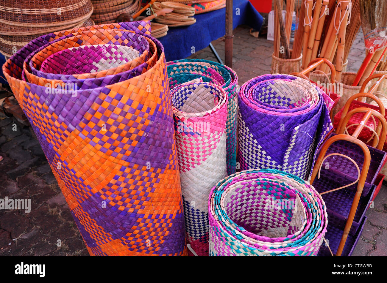 Neatly woven straw mat and a range of colors. Traditional Malay straw
