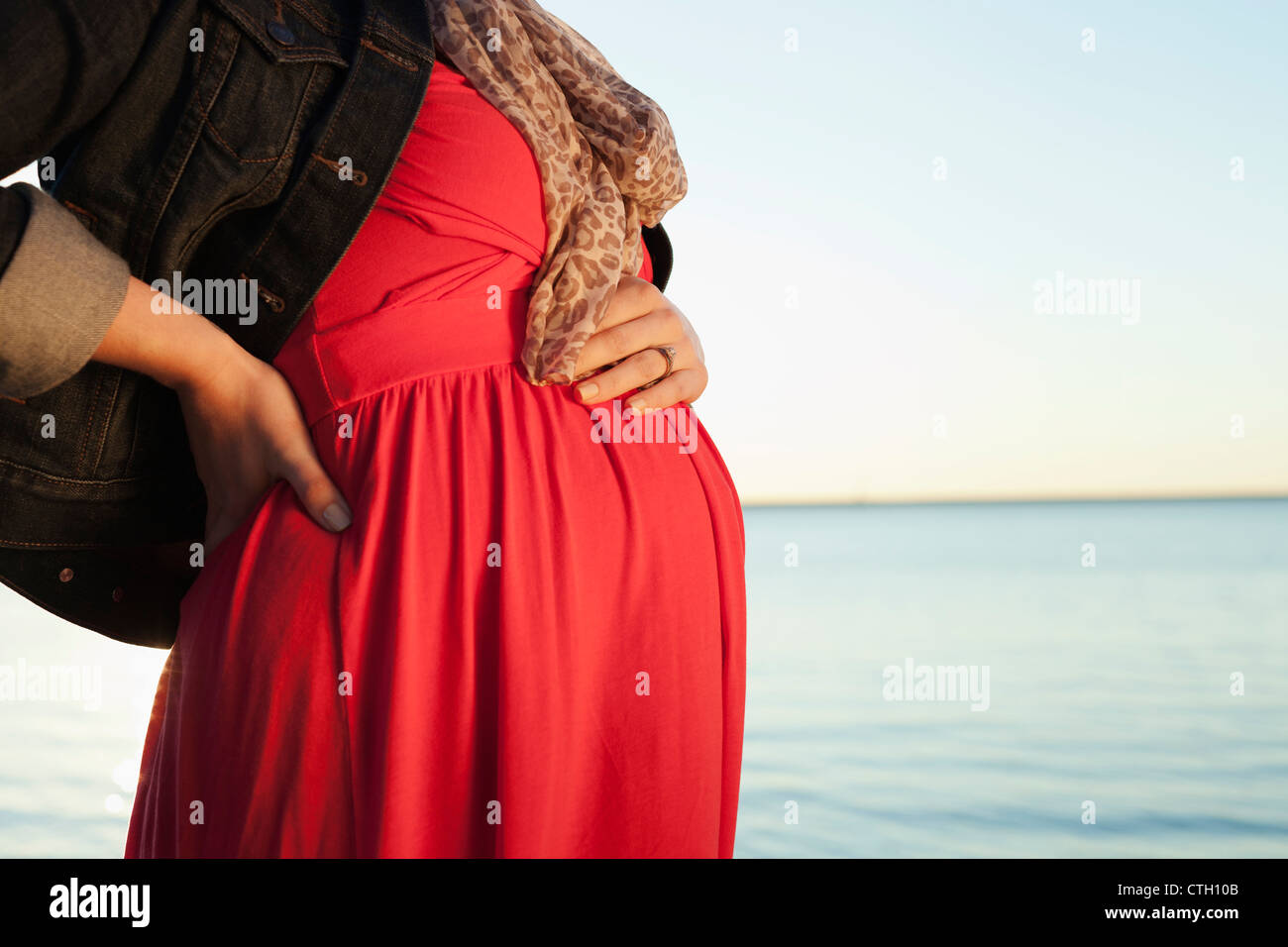 Close up pregnant woman caressing hi-res stock photography and images ...
