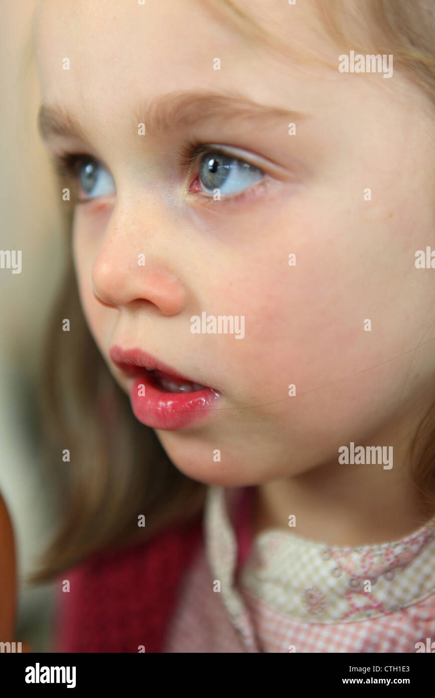 Child with glazed eyes Stock Photo Alamy