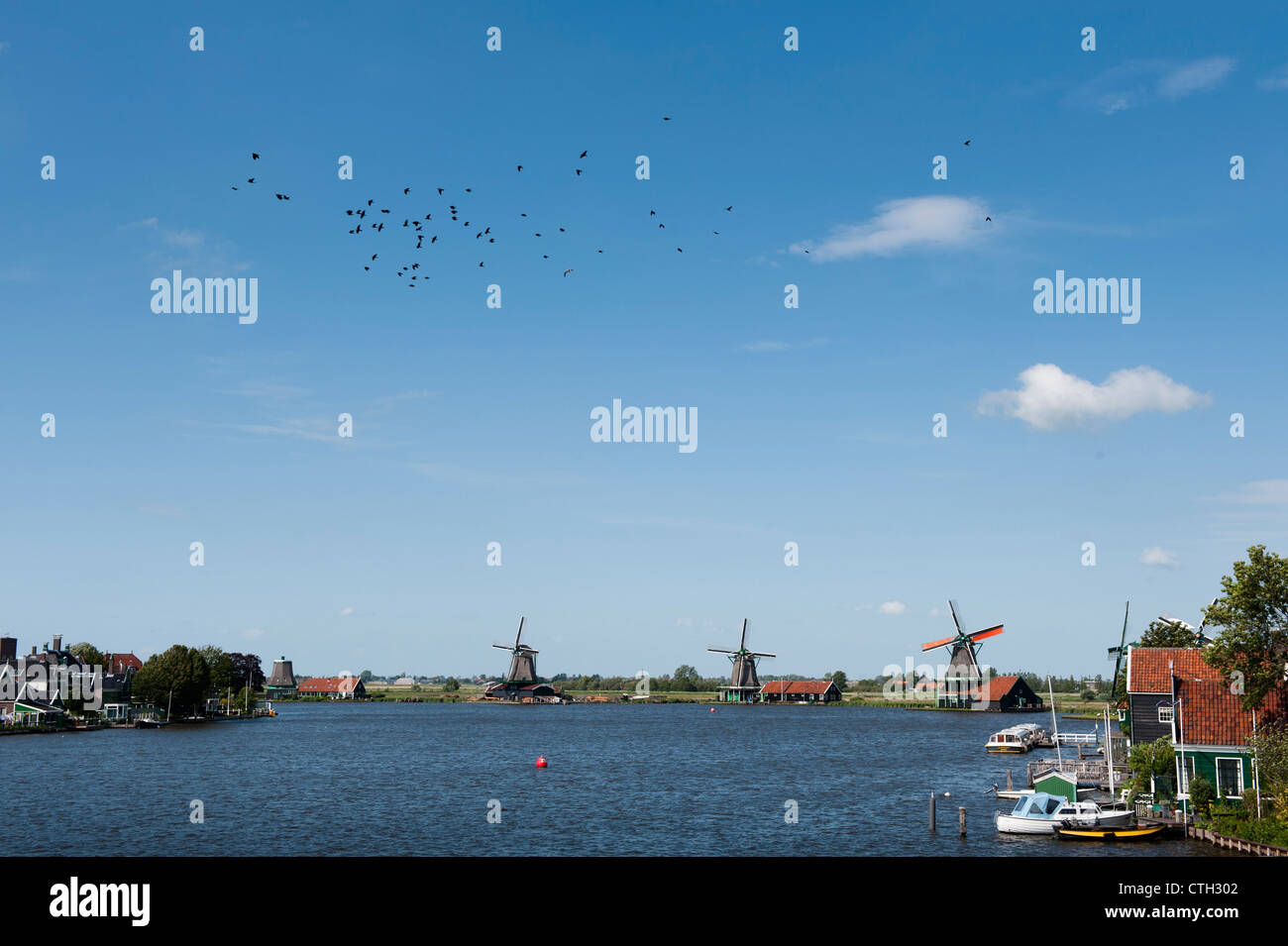 The Zaanse Schans is a neighbourhood of Zaandam. It has a collection of well-preserved historic windmills and houses. Stock Photo