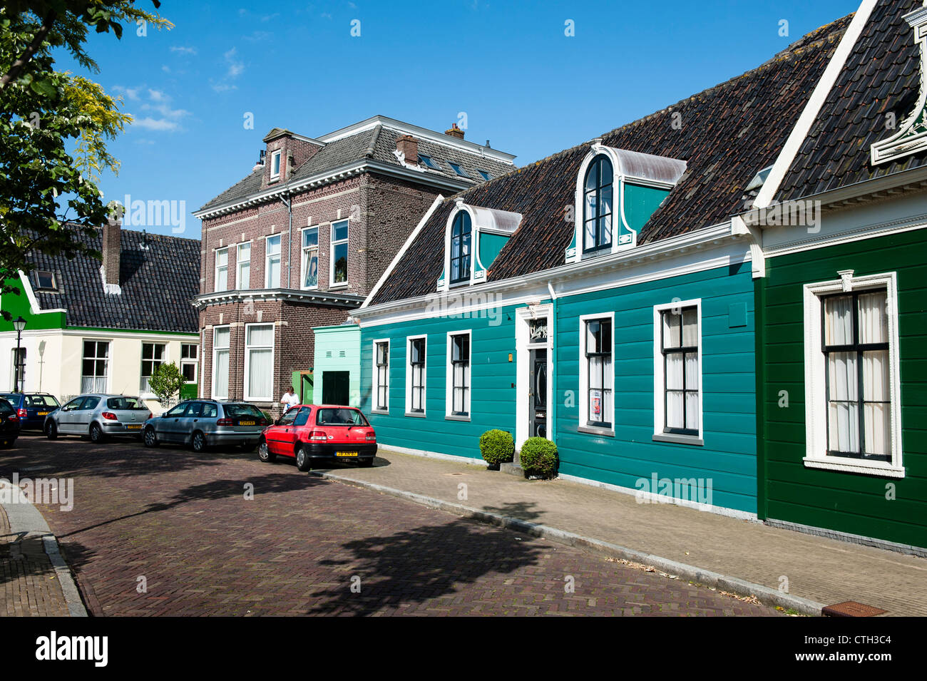 The Zaanse Schans is a neighbourhood of Zaandam. It has a collection of well-preserved historic windmills and houses. Stock Photo