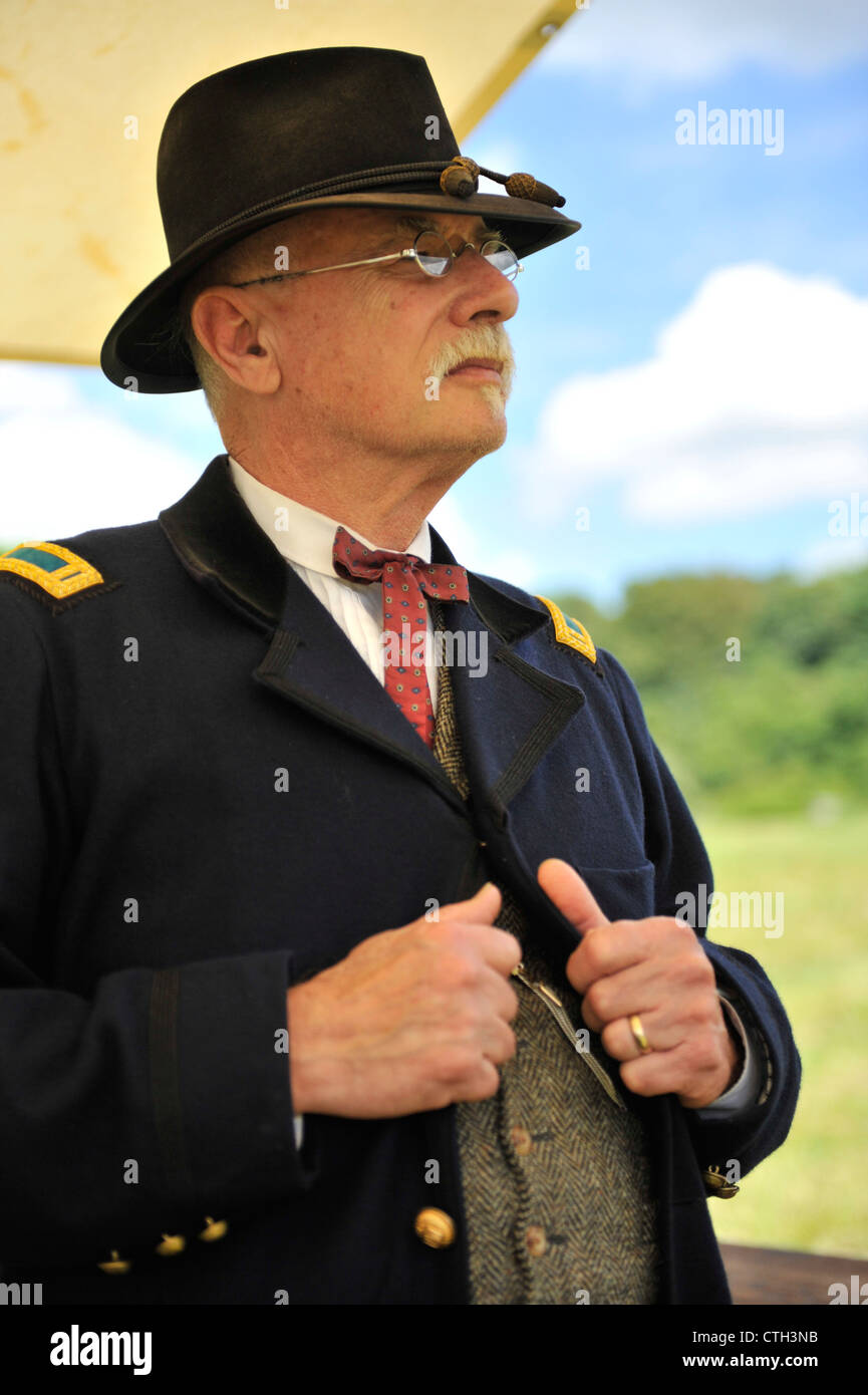 Old Bethpage, New York, USA - July 21, 2012: GUY SMITH of Huntington, NY, portrays Regimental Adjutant at Headquarters, at re-cr Stock Photo