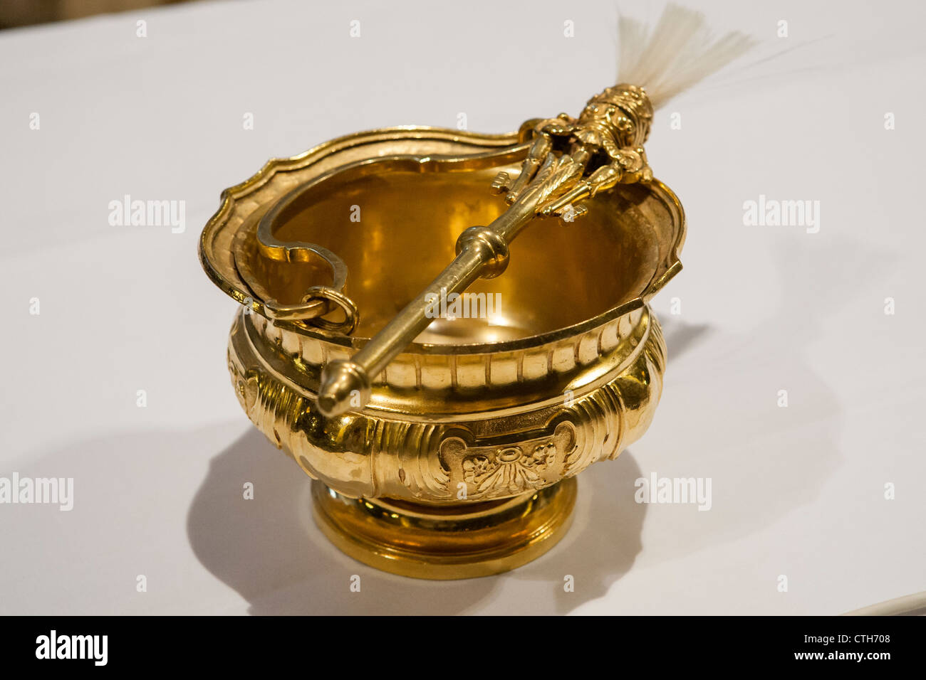 Gold font containing holy water in the chapel of St. Peter, Rome, Italy, Europe Stock Photo