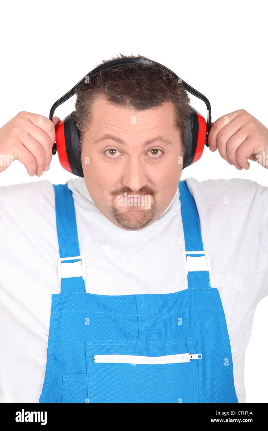 Working man with earmuffs Stock Photo Alamy