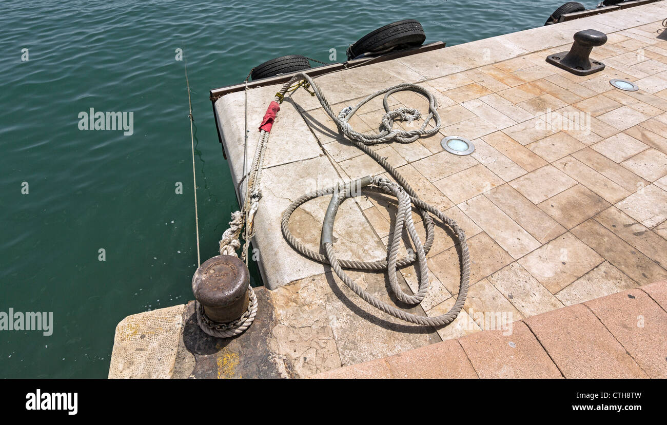 docks with ropes to tie boats Stock Photo Alamy