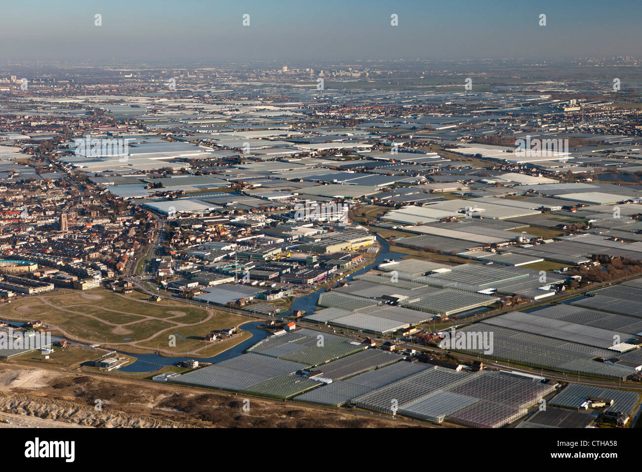 The Netherlands, Monster, Westland region. Horticulture in greenhouses. Aerial. Stock Photo