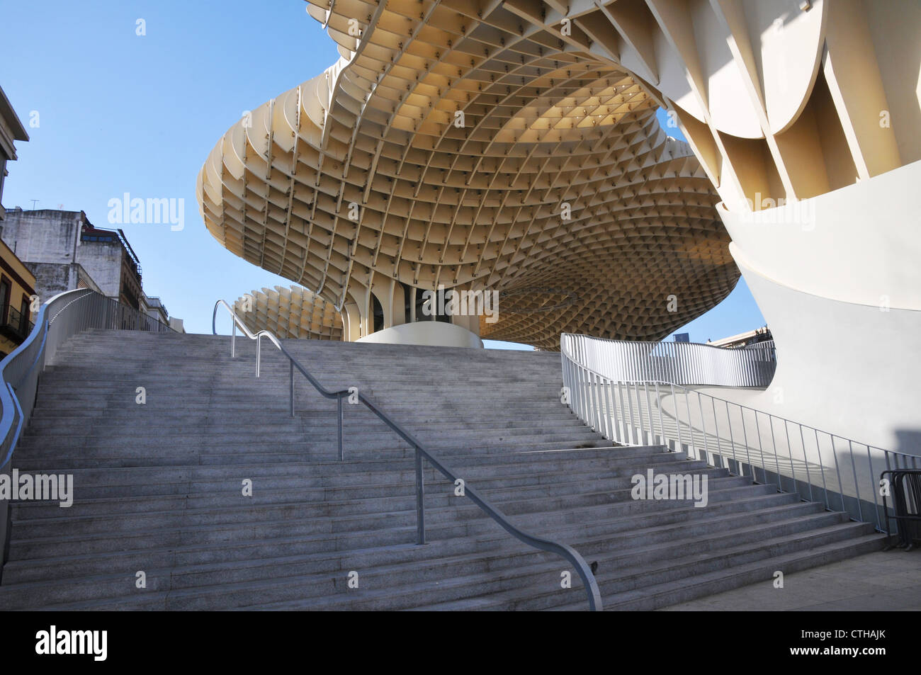 Wide stairway leading from street level, Plaza de la Encarnacion with modern architectural roof structure, Seville, Spain Stock Photo