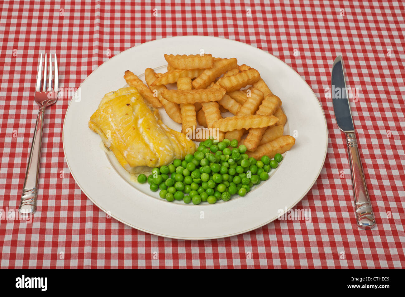 Smoked Haddock, chips and peas Stock Photo Alamy
