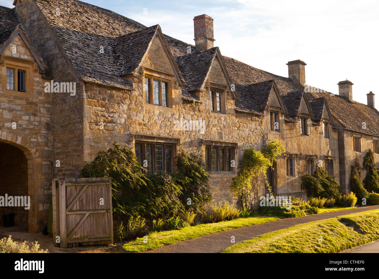 Evening light falling on cottages in the Cotswold village of Stanton, Gloucestershire Stock Photo