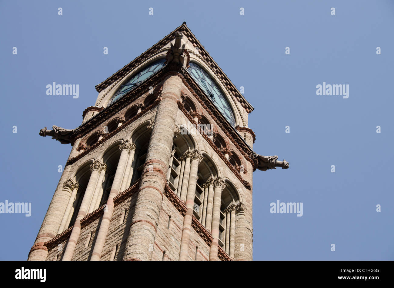 Canada, Ontario, Toronto. Old City Hall, 19th century neo-Romanesque style. Clock tower detail with gargoyles. Stock Photo